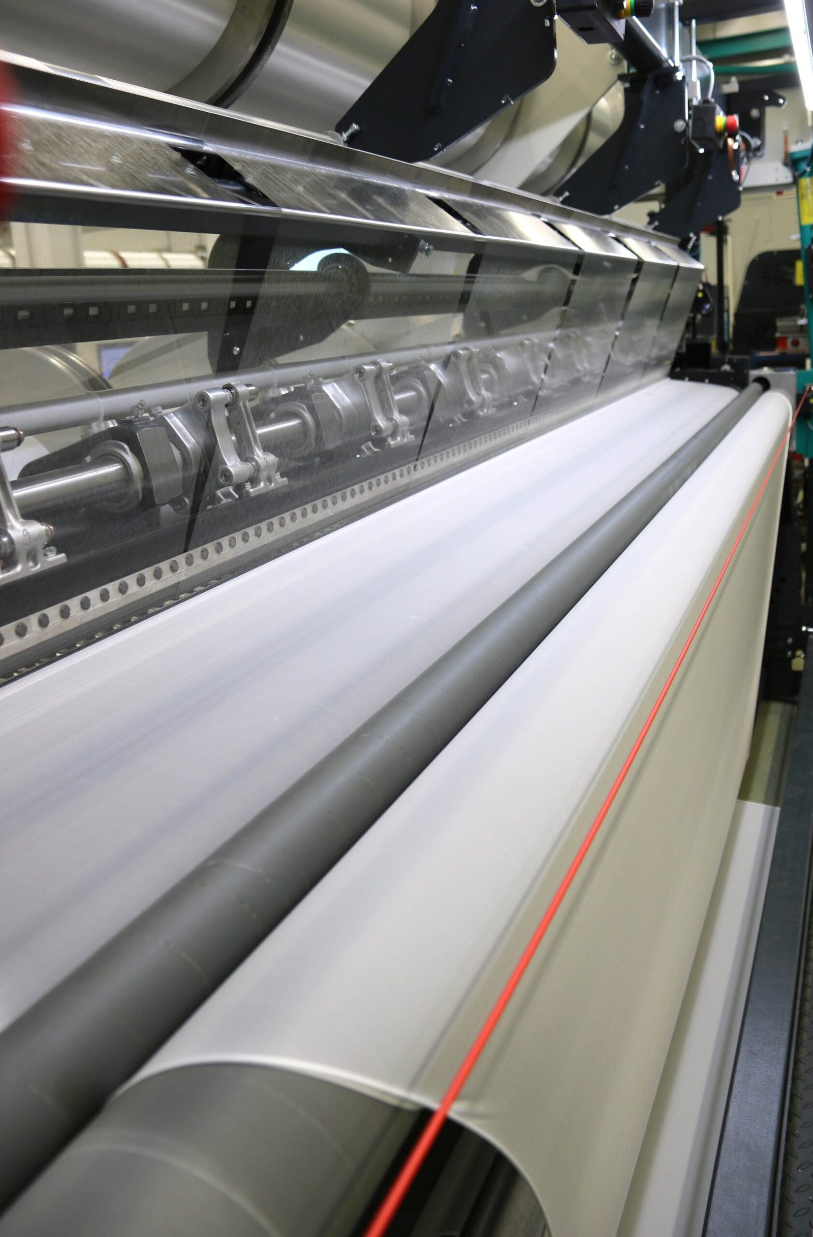 Efficient warp knitting machines at work,